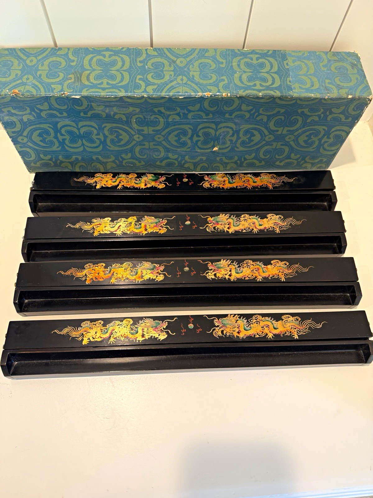 vintage set of four black lacquered and hand-painted Mahjong tile racks vintage set of four black lacquered and hand-painted Mahjong tile racks