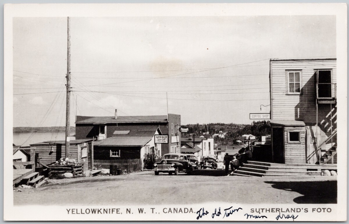 Yellowknife NWT Street View \'Main Drag\' Coffee Shop Sutherland\'s RP Postcard H69