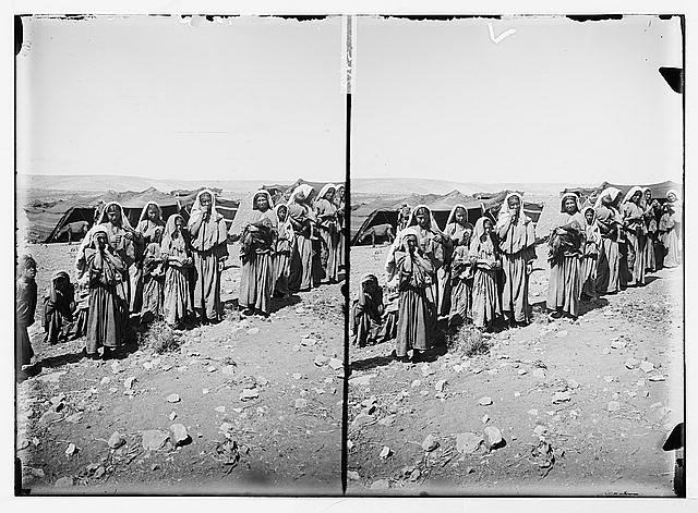 Bedouins watching women at encampments,Middle East,Nomadic Arabs,1898-1946