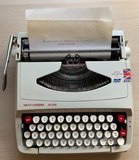 Smith-Corona De Luxe Portable Typewriter Cream with Certification 1975 picture