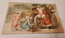  Long Red Robe SANTA Fixing Auto W/ Angels Postcard Used Cancelled  Stamped 1909 picture
