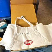 Original, vintage Le Cirque chef's apron featuring Sirio Maccioni's signature picture