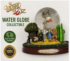 Wizard of Oz Collectible Water Globe Dorothy Scarecrow Tin Man Lion Yellow Brick picture