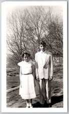 Vintage 1940s Black & White Photo Teen Couple Formal Attire Outdoor picture