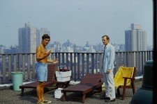 c1970's Kodachrome 35mm Slide, Men Rooftop City Skyline Lounge Chairs swimming picture