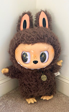 POP MART THE MONSTERS Angel in Clouds Flocked Figure 21 in Brown picture
