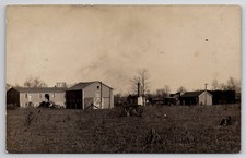 RPPC Working Farm Barn Barrels RR E & T.H. - Missouri & North Arkansas Postcard picture