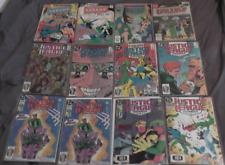 lot of 12 vintage justice league america comics dc picture