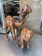 Two Beautiful Tall Handmade Leather Statues picture
