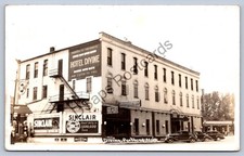 K59/ Portland Michigan RPPC Postcard c1940s Hotel Divine Stores  363 picture