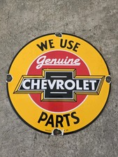VINTAGE WE USE GENUINE CHEVROLET PARTS  PORCELAIN SIGN 12