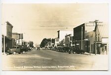 Saratoga WY Bridge Street Store Fronts Old Cars RPPC Real Photo Postcard picture