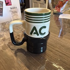 AC Delco Spark Plug Ceramic Mug 10 Oz Black And Ivory With Green Stripes picture