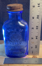 ☮️ Vintage Cobalt Blue Glass Milk of Magnesia Bottle Embossed; w/org cap picture