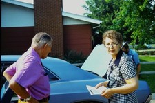 c1970's Kodachrome 35mm Slide, Elderly Couple with Blue GM A Body Coupe Car picture