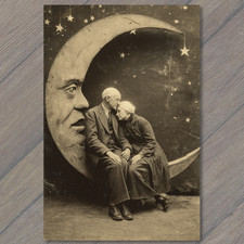 POSTCARD Elderly Couple Resting Upon Crescent Moon Vintage Night Sky Stars ``` picture