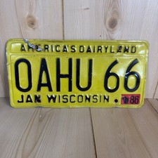 Vintage 1986 Wisconsin Yellow License Plate America's Dairyland Custom Oahu 66 picture